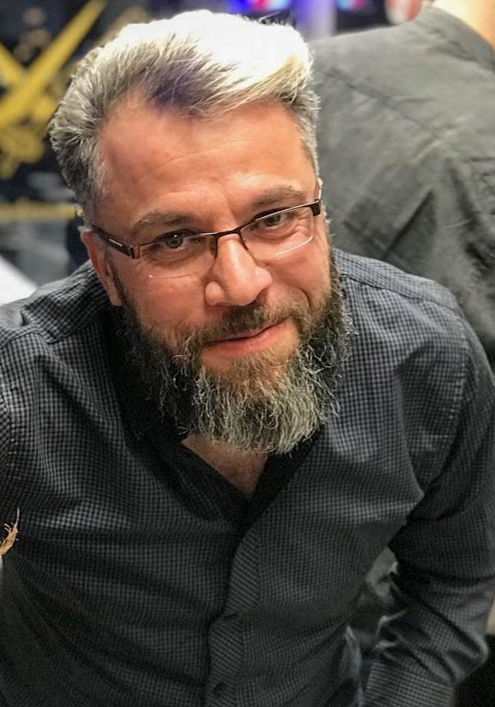 Hassan – barberare på Kingsman Barbershop i Majorna, Göteborg